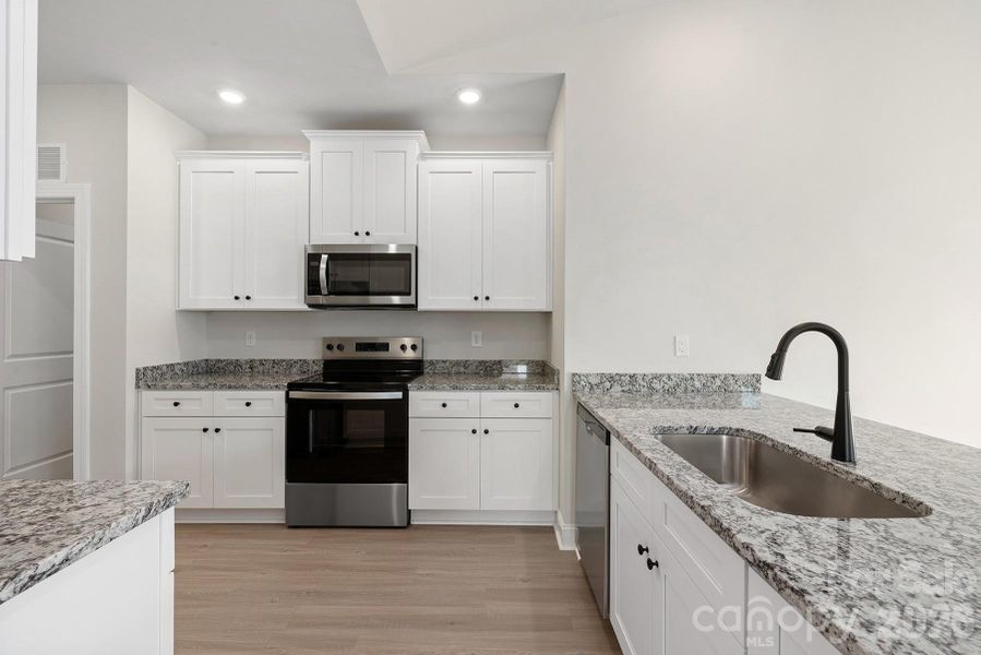 Furnished interior view inside a new home in Willow Estates, Shelby (Image 9).