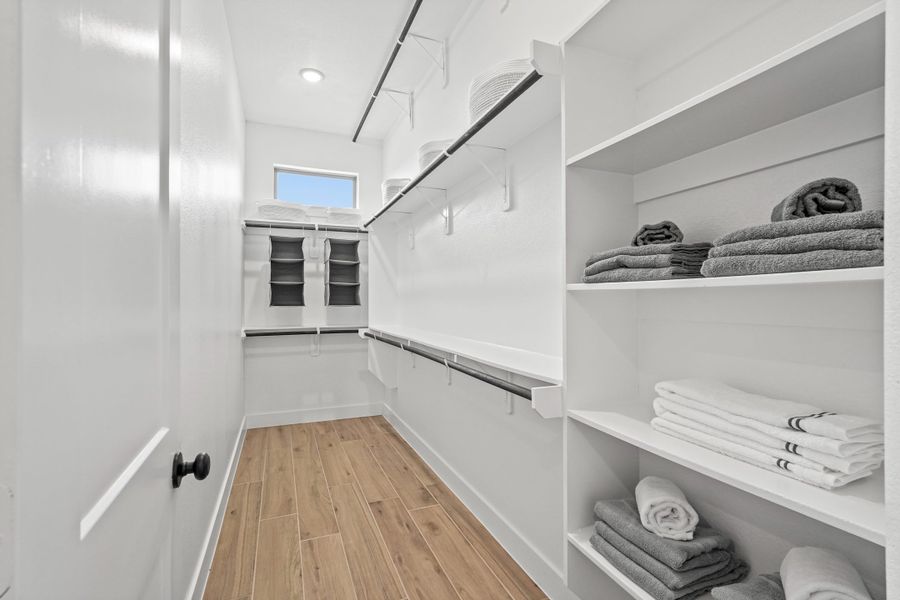 Furnished interior view inside a new home in Bridgeland, Cypress (Image 38).