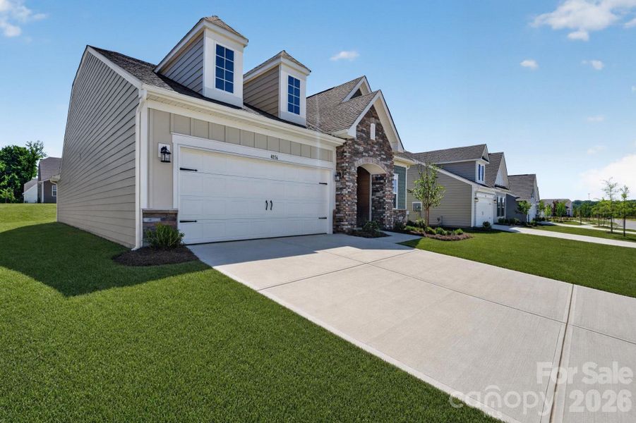 Front exterior of a new home in Roselyn, Lancaster, SC, highlighting curb appeal (Image 16). Front exterior of a new home in Roselyn, Lancaster, SC, highlighting curb appeal (Image 16).