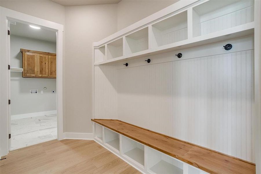 Mudroom featuring light hardwood / wood-style floors