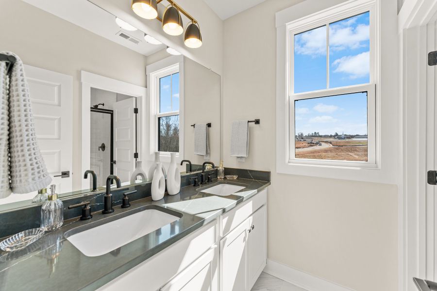 Representative furnished interior of a home built from the Emmy by Hunter Quinn Homes in Walker's Pointe, Anderson (Image 29).