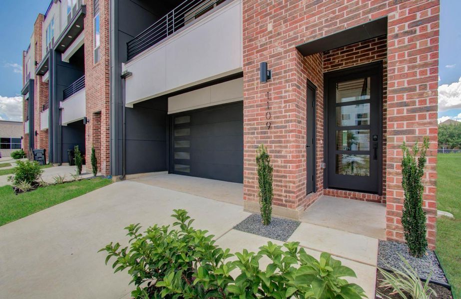 Front exterior of a new home in , Houston, TX, highlighting curb appeal (Image 1).