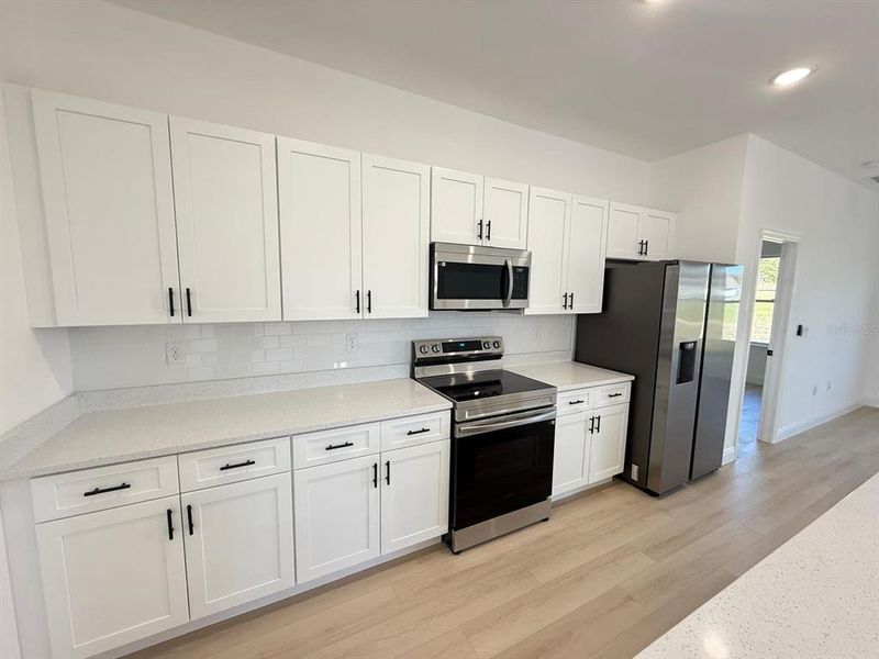Furnished interior view inside a new home in , Ocala (Image 6).