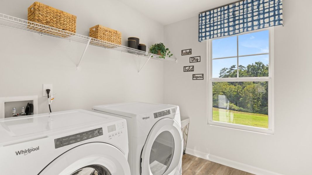Representative furnished interior of a home built from the Halton by D.R. Horton in Brooks Station, Dacula (Image 52).