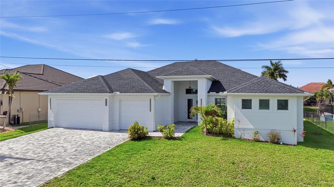 Front exterior of a new home in , Cape Coral, FL, highlighting curb appeal (Image 23).