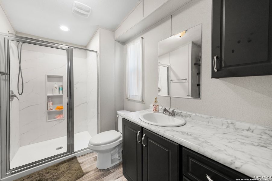 Furnished interior view inside a new home in , Elmendorf (Image 6).