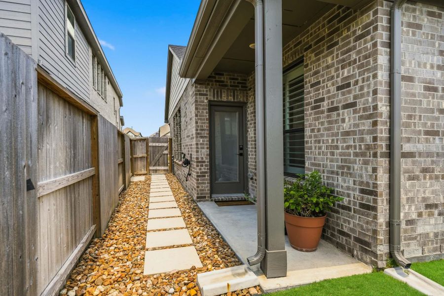 Exterior details and patio area of a home in Meridiana 40', 65', Iowa Colony (Image 4).
