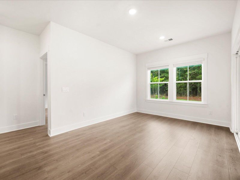 Spacious, unfurnished interior of a new home in The Coves at Lakes of Cane Bay, Summerville (Image 20). Spacious, unfurnished interior of a new home in The Coves at Lakes of Cane Bay, Summerville (Image 20).
