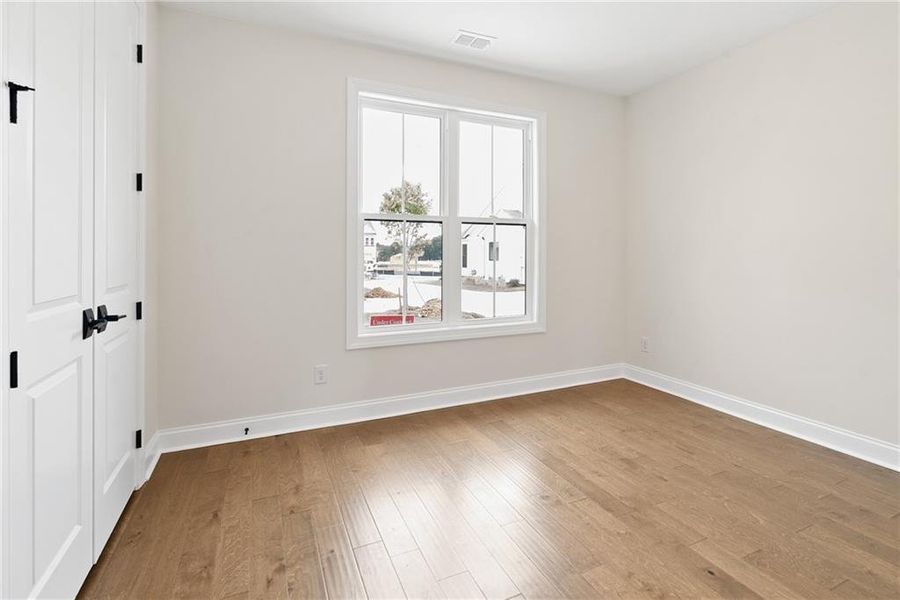 Spacious, unfurnished interior of a new home in Promenade at Sawnee Village, Cumming (Image 35).