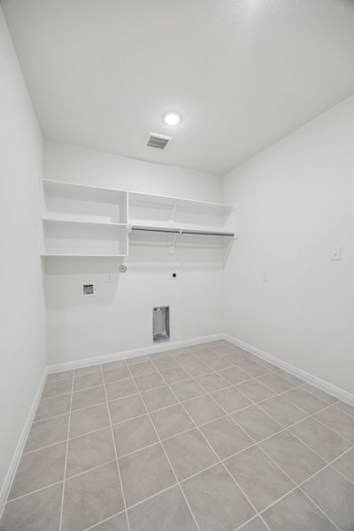 Utility Room in the Magnolia home plan by Trophy Signature Homes – REPRESENTATIVE PHOTO