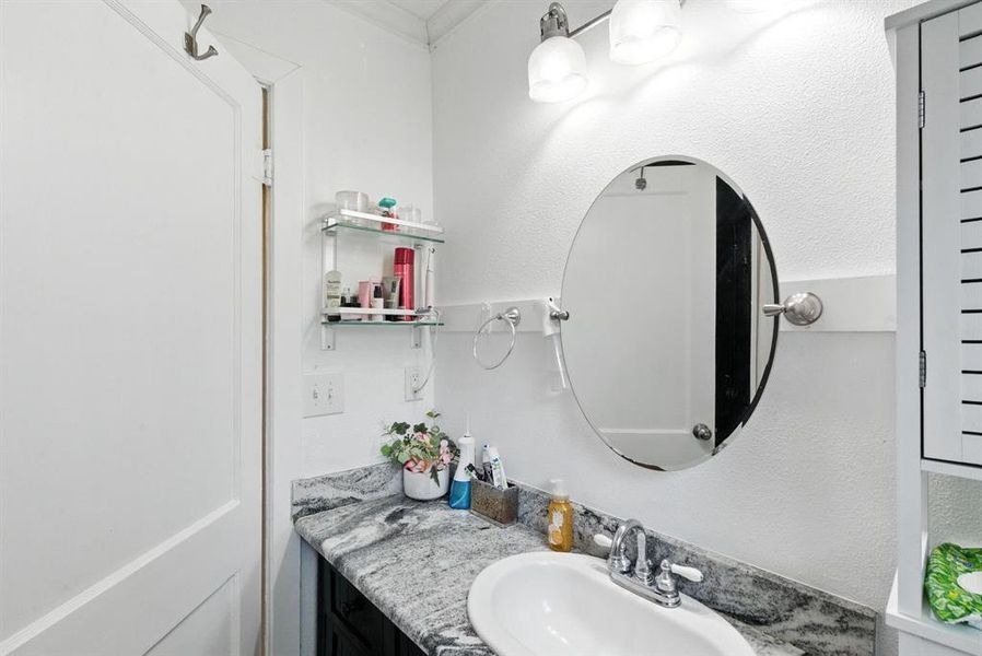 Bathroom featuring vanity Bathroom featuring vanity