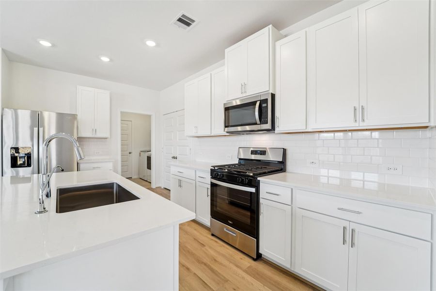Photo is not of the actual home, but is an inspirational photo of builder’s model home and may depict options, furnishings, and/or decorator features that are not included
