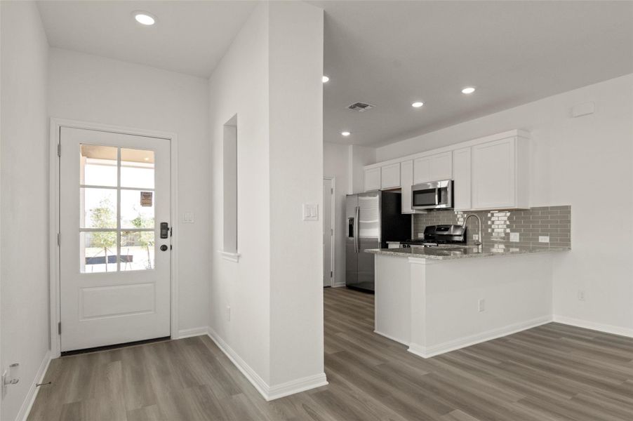 Furnished interior view inside a new home in Crosswinds, Kyle (Image 11).