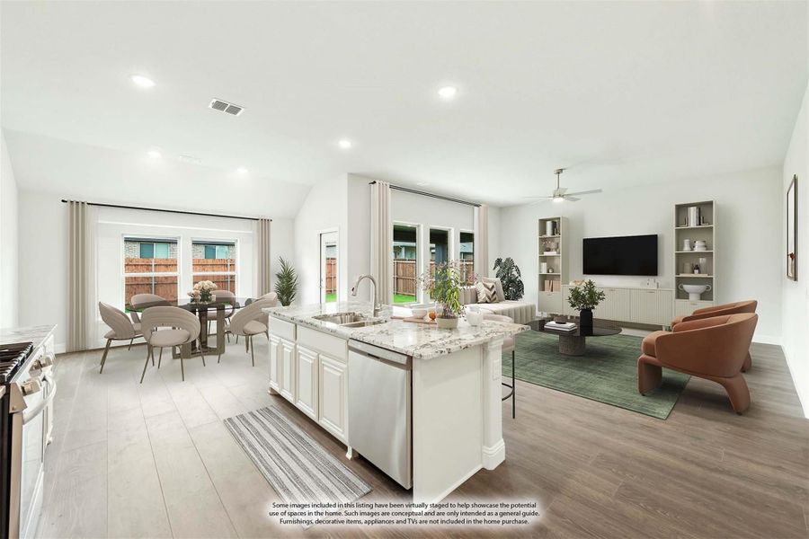 Open-concept living area with kitchen island, dining space, and living room with hardwood floors and large windows Open-concept living area with kitchen island, dining space, and living room with hardwood floors and large windows