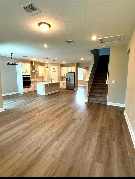 Spacious, unfurnished interior of a new home in Legends Preserve - Signature Series, Daytona Beach (Image 13).