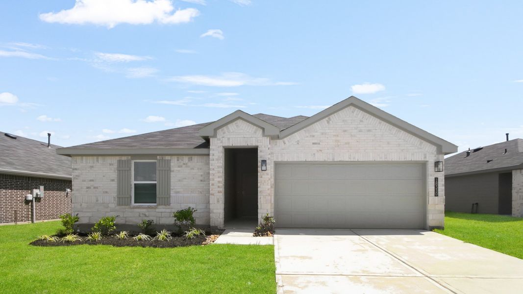 Front exterior of a new home in Porters Mill, New Caney, TX, highlighting curb appeal (Image 1). Front exterior of a new home in Porters Mill, New Caney, TX, highlighting curb appeal (Image 1).