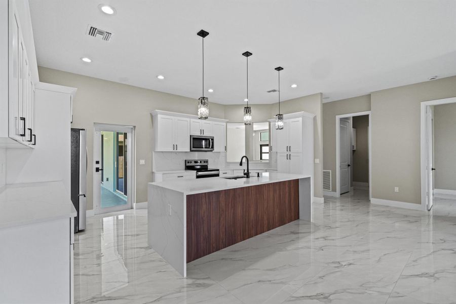 Furnished interior view inside a new home in , Port St. Lucie (Image 9).