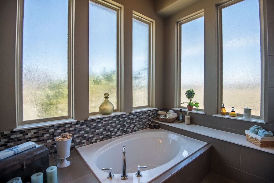 Representative furnished interior of a home built from the Kennedy by Windmiller Custom Homes in The Highlands, Northlake (Image 15).