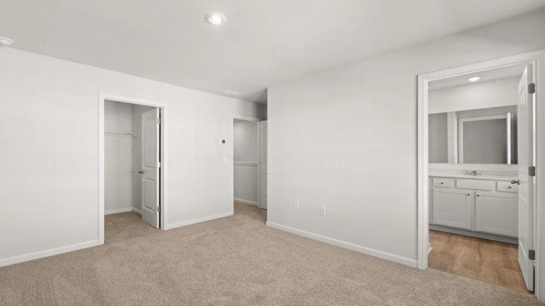 Spacious, unfurnished interior of a new home in Waypoint, Flowery Branch (Image 14).