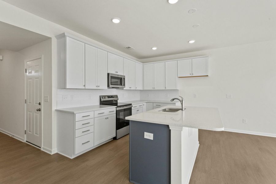 Furnished interior view inside a new home in Bellevue Townhomes, Greenville (Image 6). Furnished interior view inside a new home in Bellevue Townhomes, Greenville (Image 6).