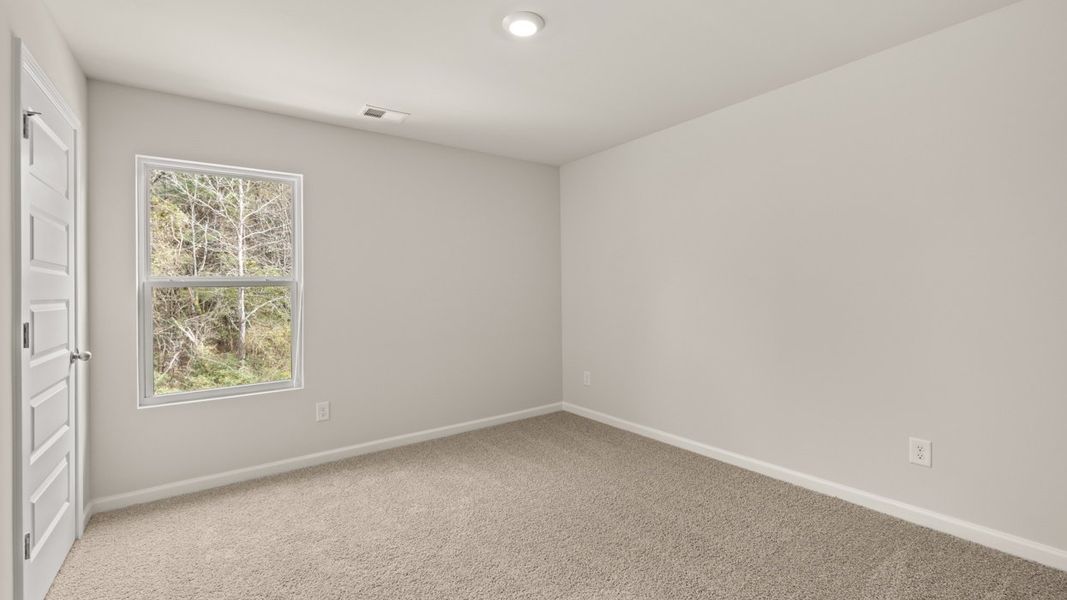 Spacious, unfurnished interior of a new home in The Reserve at Calcutta, Stockbridge (Image 25).