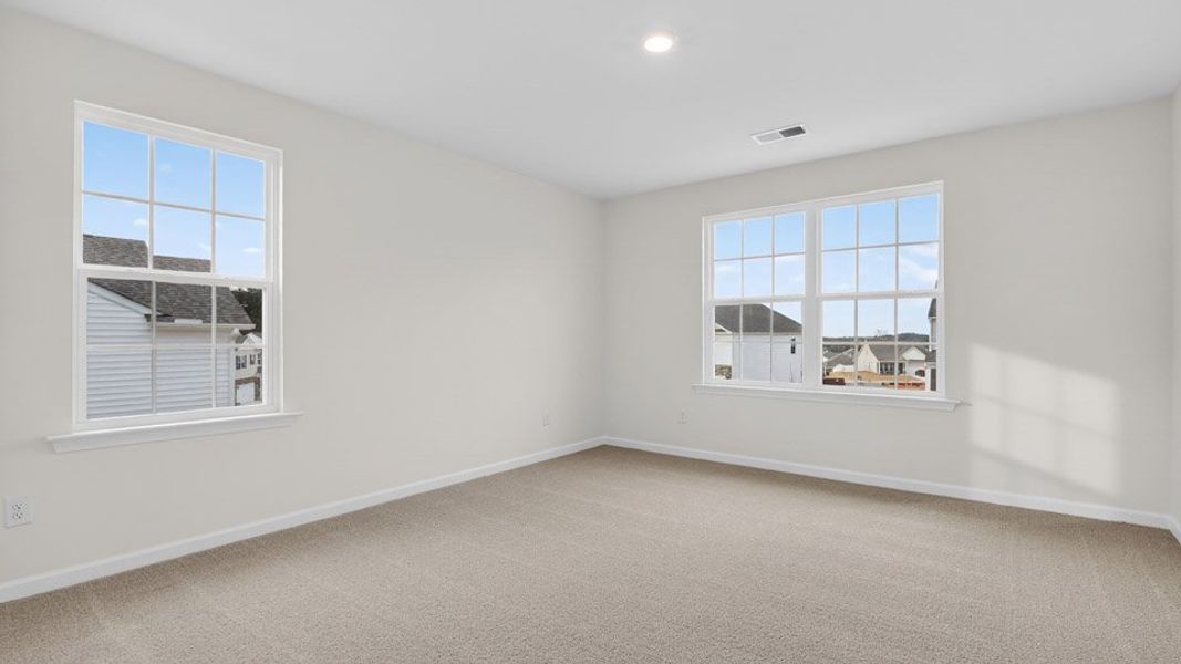 Spacious, unfurnished interior of a new home in Gretchen Pines, West End (Image 30).