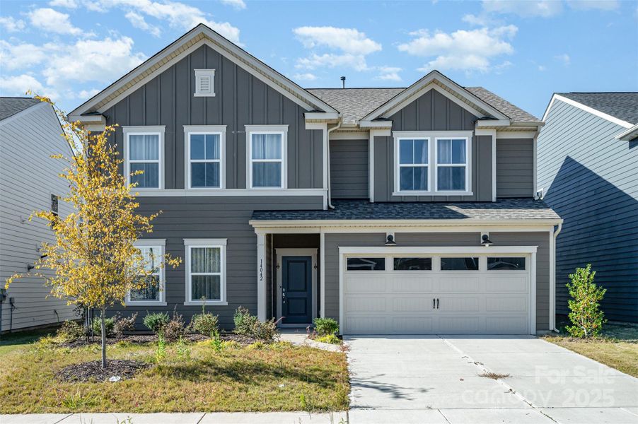 Front exterior of a new home in Parkside Crossing, Charlotte, NC, highlighting curb appeal (Image 2).