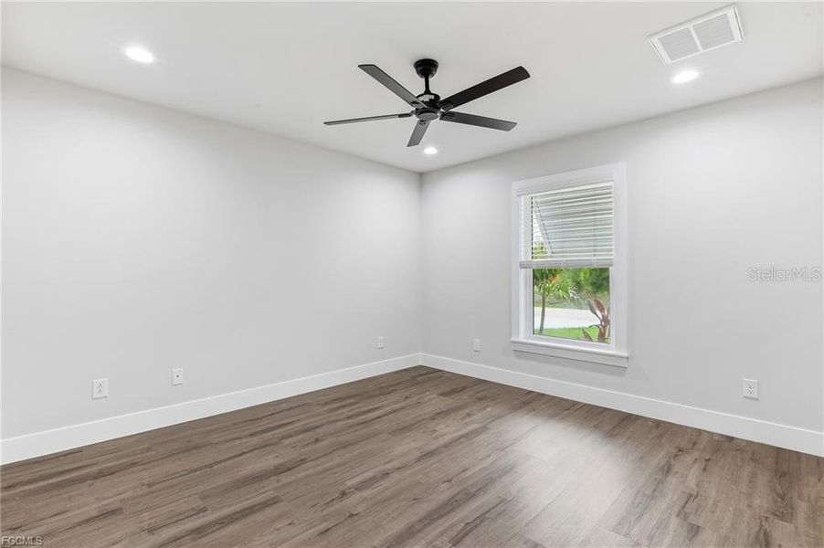 Spacious, unfurnished interior of a new home in , Punta Gorda (Image 18).