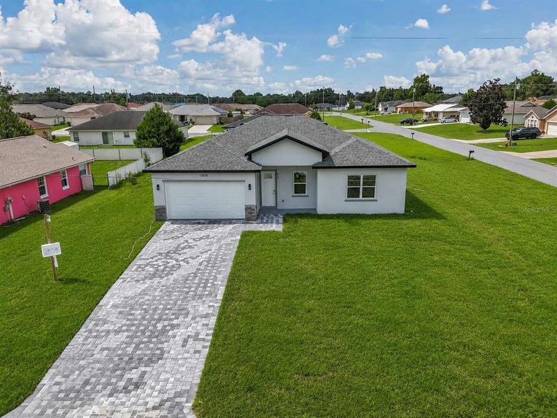 Front exterior of a new home in , Ocala, FL, highlighting curb appeal (Image 2). Front exterior of a new home in , Ocala, FL, highlighting curb appeal (Image 2).