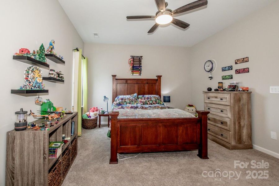 Furnished interior view inside a new home in Signature at Reid's Cove, Mooresville (Image 11).