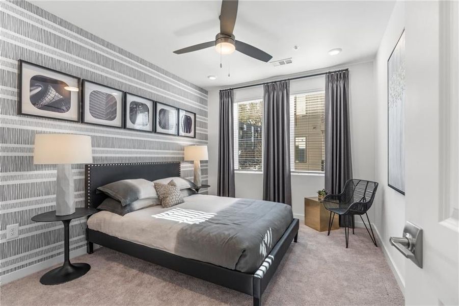 The secondary Bedroom is filled with natural light!*Images from the model home. Not subject unit*