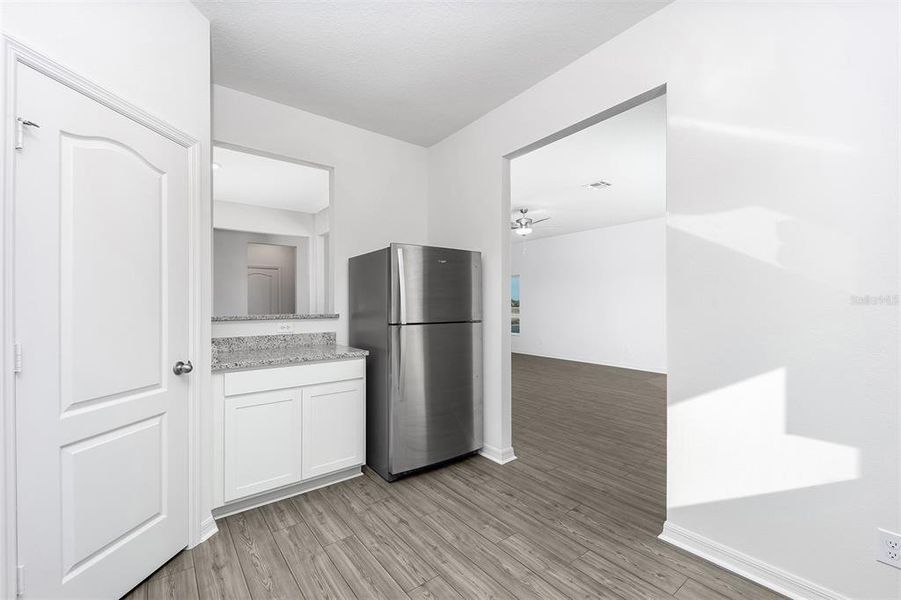 Furnished interior view inside a new home in Gum Lake Preserve, Lake Alfred (Image 9).
