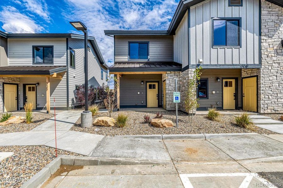 Front exterior of a new home in , Granby, CO, highlighting curb appeal (Image 21).