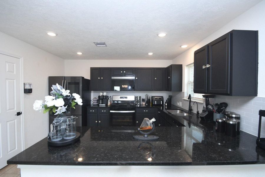Furnished interior view inside a new home in , Katy (Image 13).