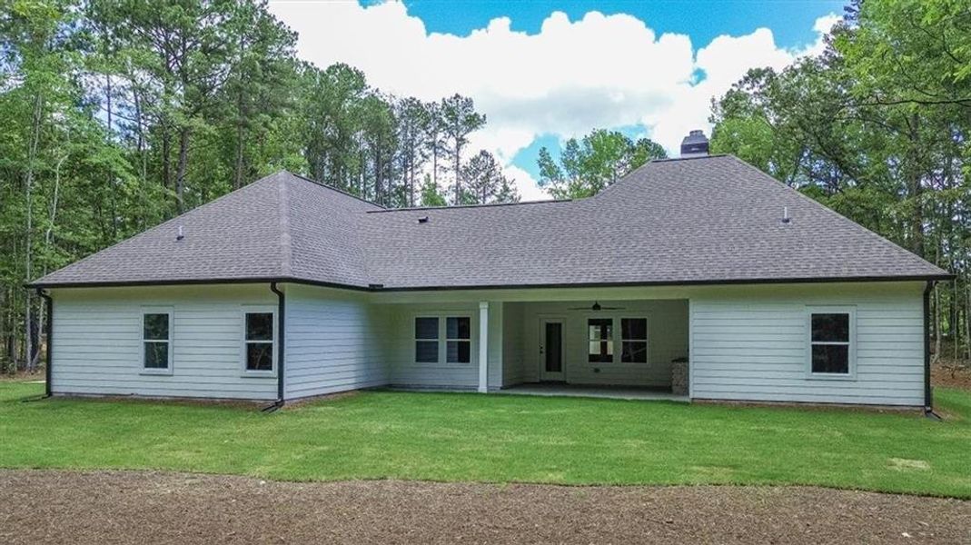 Front exterior of a new home in , Social Circle, GA, highlighting curb appeal (Image 27). Front exterior of a new home in , Social Circle, GA, highlighting curb appeal (Image 27).