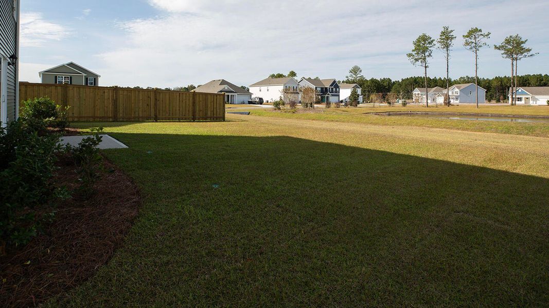 Exterior details and patio area of a home in Sidbury Station, Castle Hayne (Image 19).