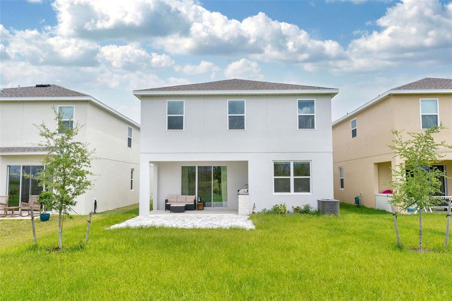 Front exterior of a new home in , Clermont, FL, highlighting curb appeal (Image 22).