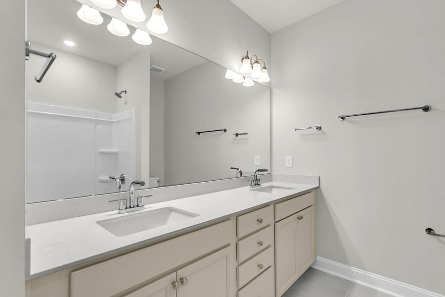Furnished interior view inside a new home in Tidewater at Lakes of Cane Bay, Summerville (Image 12).