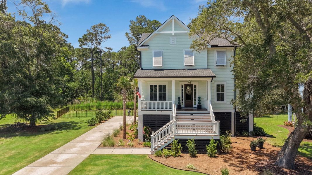 Front exterior of a new home in , Johns Island, SC, highlighting curb appeal (Image 26). Front exterior of a new home in , Johns Island, SC, highlighting curb appeal (Image 26).