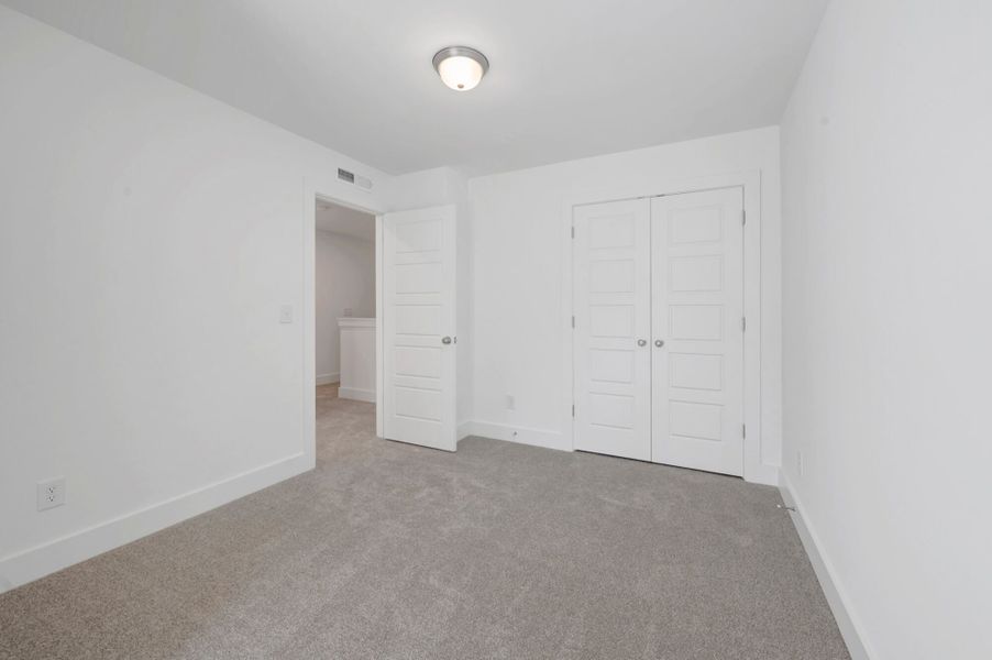Spacious, unfurnished interior of a new home in Ashmore Townes, Garner (Image 23).