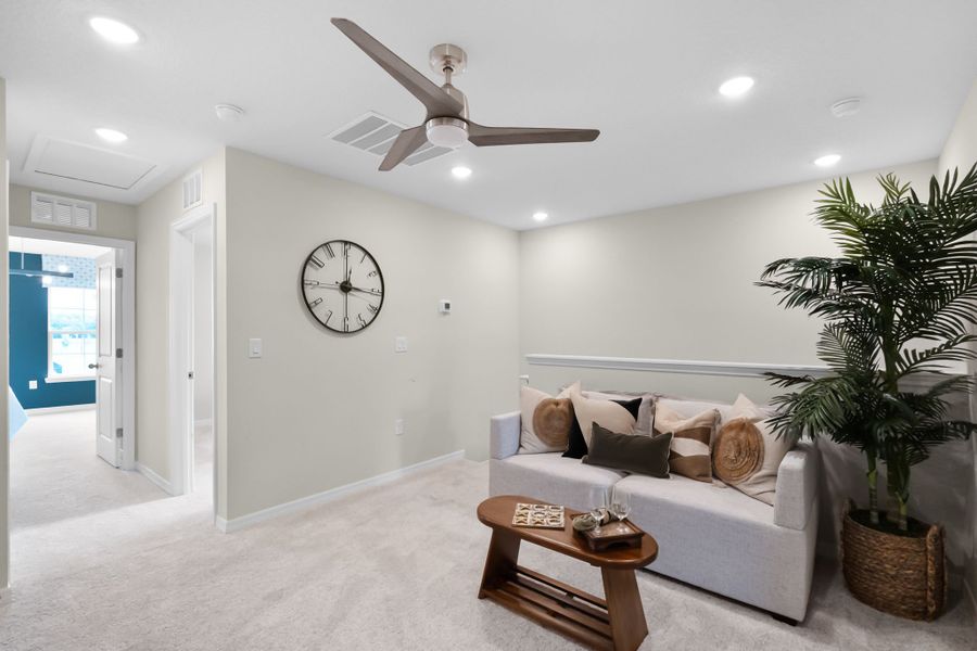 Representative furnished interior of a home built from the Malory by Hartizen Homes in Delaney Reserve, Deland (Image 23).