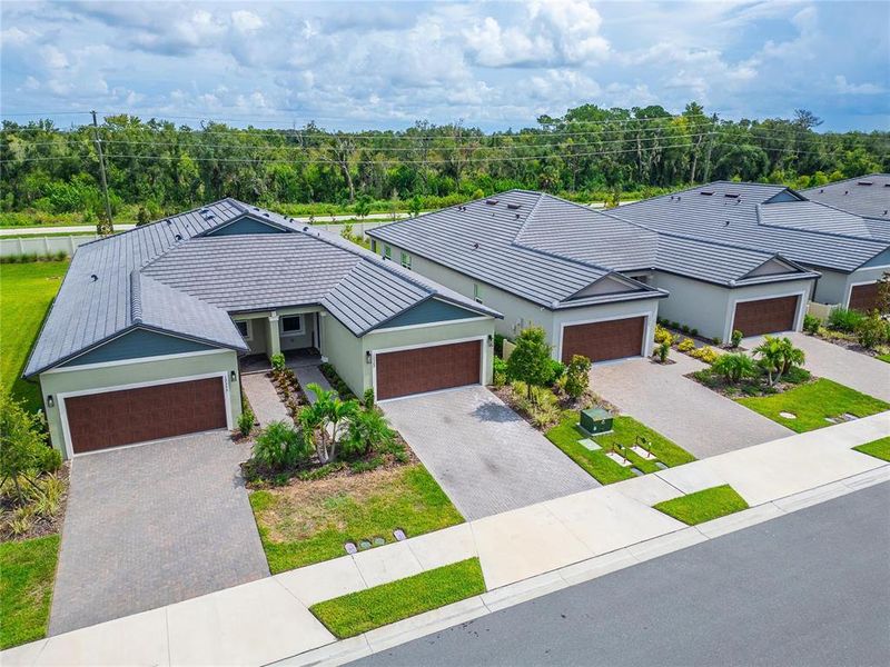 Front exterior of a new home in , Parrish, FL, highlighting curb appeal (Image 30).