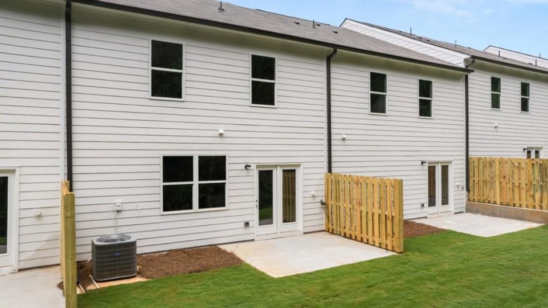Exterior details and patio area of a home in Waypoint, Flowery Branch (Image 3).