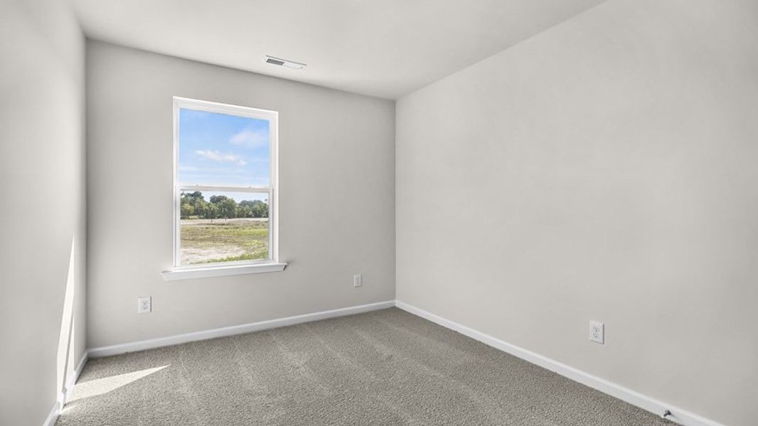 Spacious, unfurnished interior of a new home in Edinborough Townes, Gibsonville (Image 16).