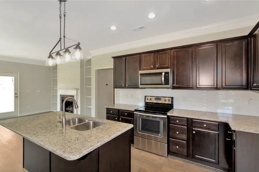 Representative furnished interior of a home built from the Furyk by RiverWILD Homes in Riverwood Ranch, Clayton (Image 13).