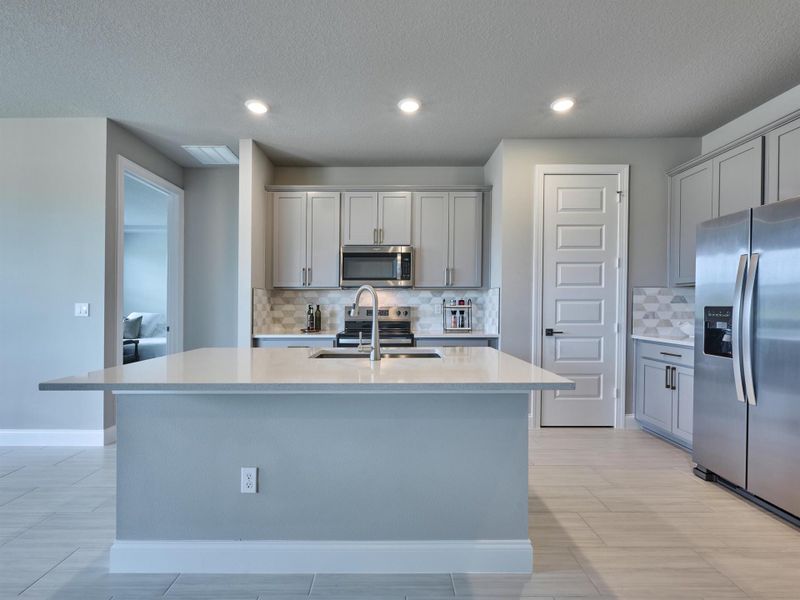 Furnished interior view inside a new home in Azalea, Port St. Lucie (Image 34).