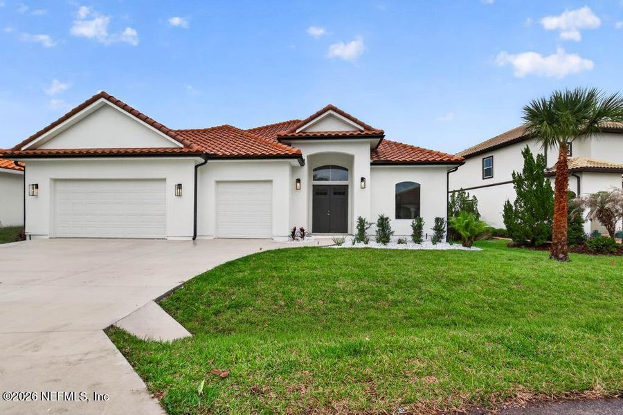 Front exterior of a new home in , St. Johns, FL, highlighting curb appeal (Image 34).