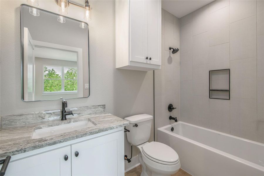 Furnished interior view inside a new home in , College Station (Image 9).