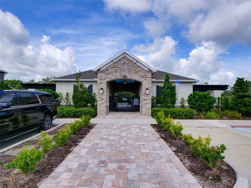 Front exterior of a new home in , Orlando, FL, highlighting curb appeal (Image 1).