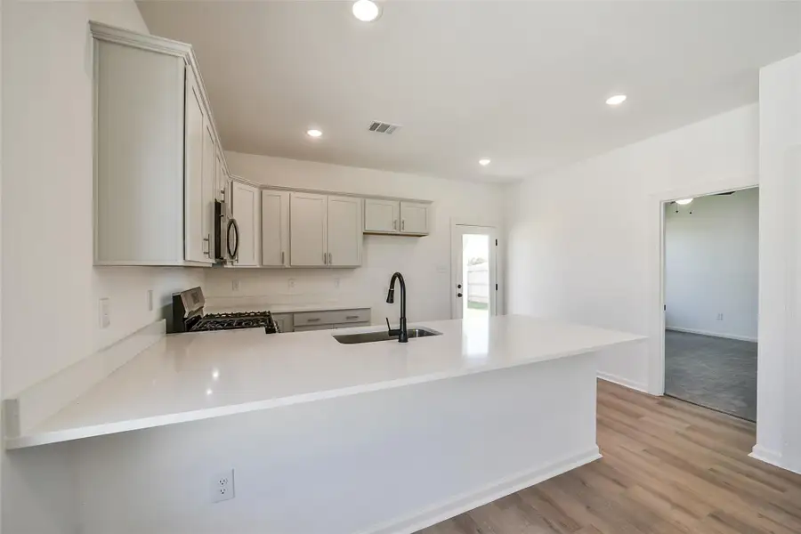 Furnished interior view inside a new home in Mostyn Springs, Magnolia (Image 9). Furnished interior view inside a new home in Mostyn Springs, Magnolia (Image 9).